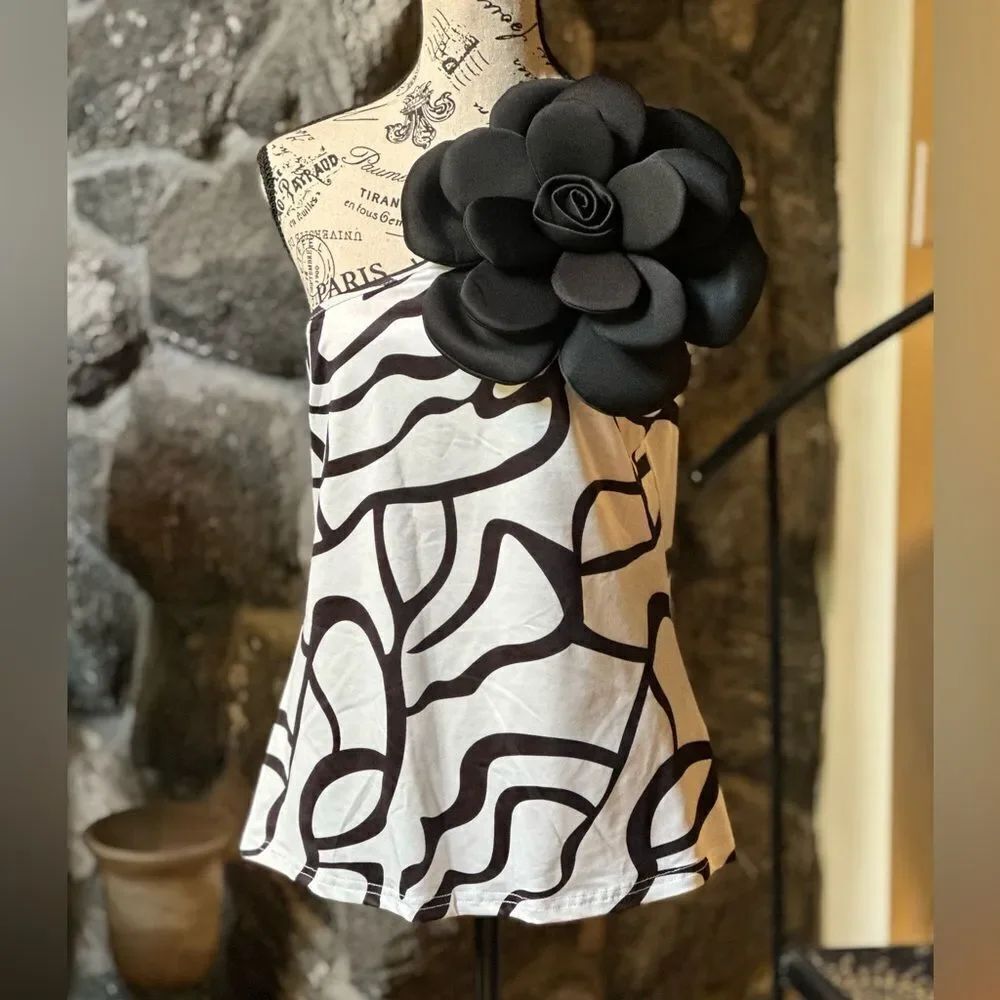 Chic Black and White Top with Floral Accent